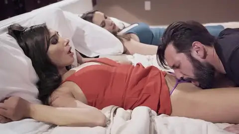 Hubby munching youthfull stunner's labia next to sleeping wifey