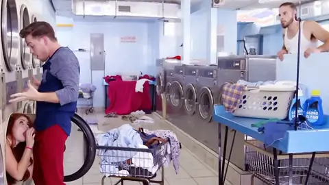 Red-haired is providing a deep throat at the laundromat