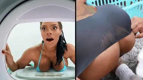 A huge-titted dark-hued gets stuck in the washing machine