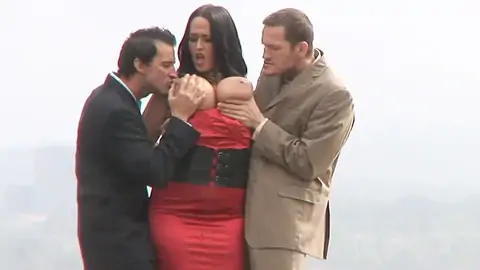 Curvy dark-haired with giant udders in dominating trio-way outdoors