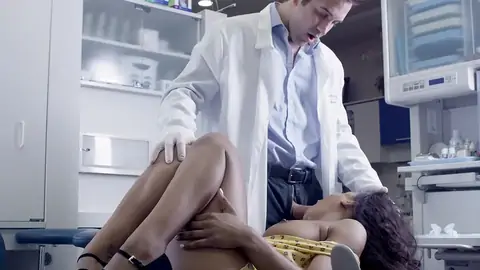 Doctor penetrates face of surprised patient in the clinic