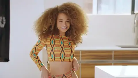 Nubile dark-hued with wavy hair is railing a humungous fuck-stick on the couch