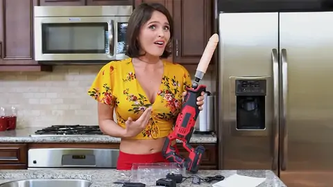 Prepping to pound the dark-haired babe with a machine